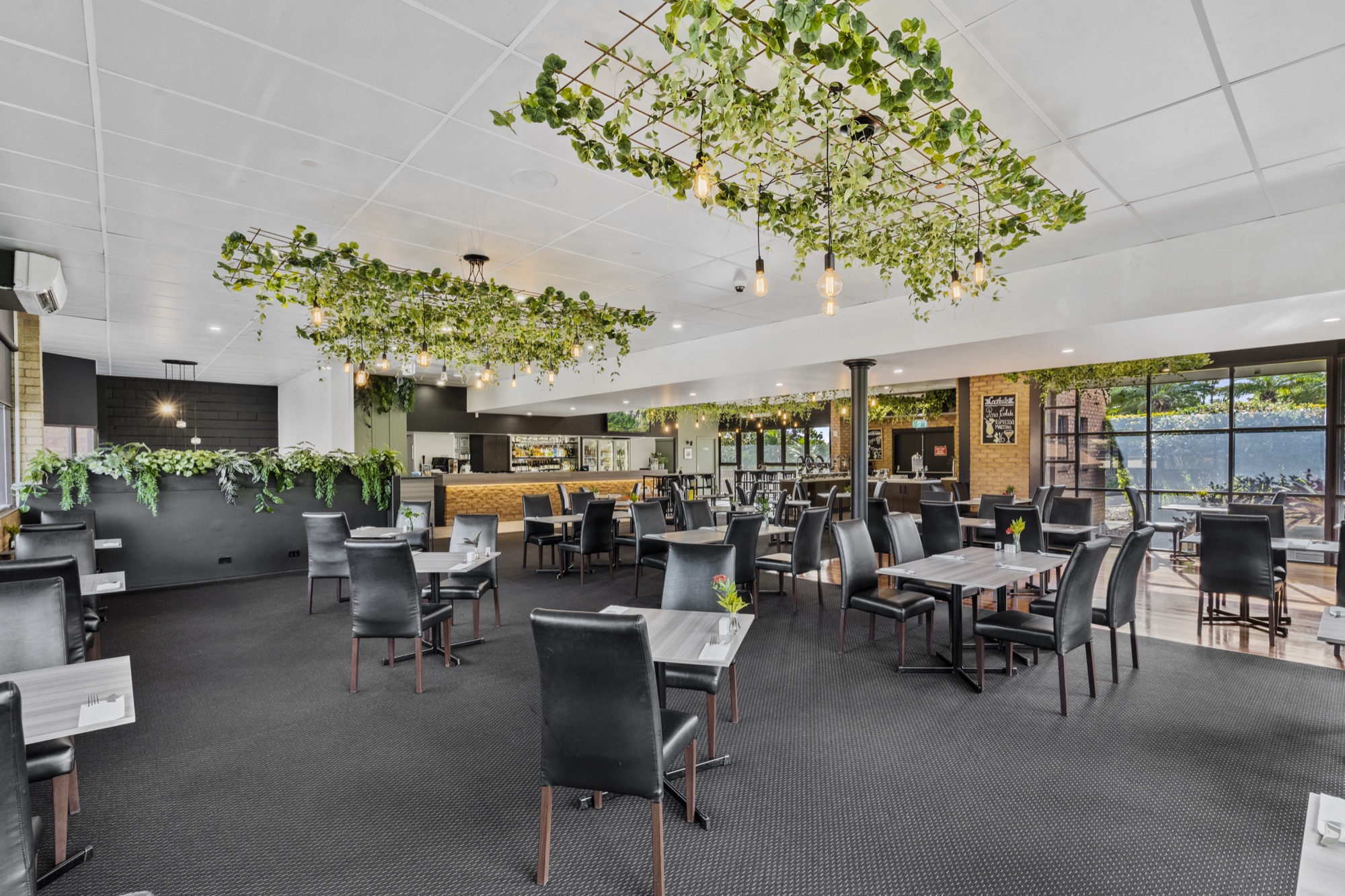 The Gardens Restaurant dining room with garden views
